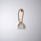 Uni-sac Quartz Bag Charm Gold