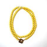 Collier de sucette jaune