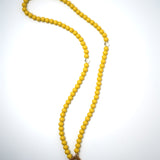 Collier de sucette jaune