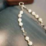 Pearl O'Clock Phone Charm With Mother Of Pearl